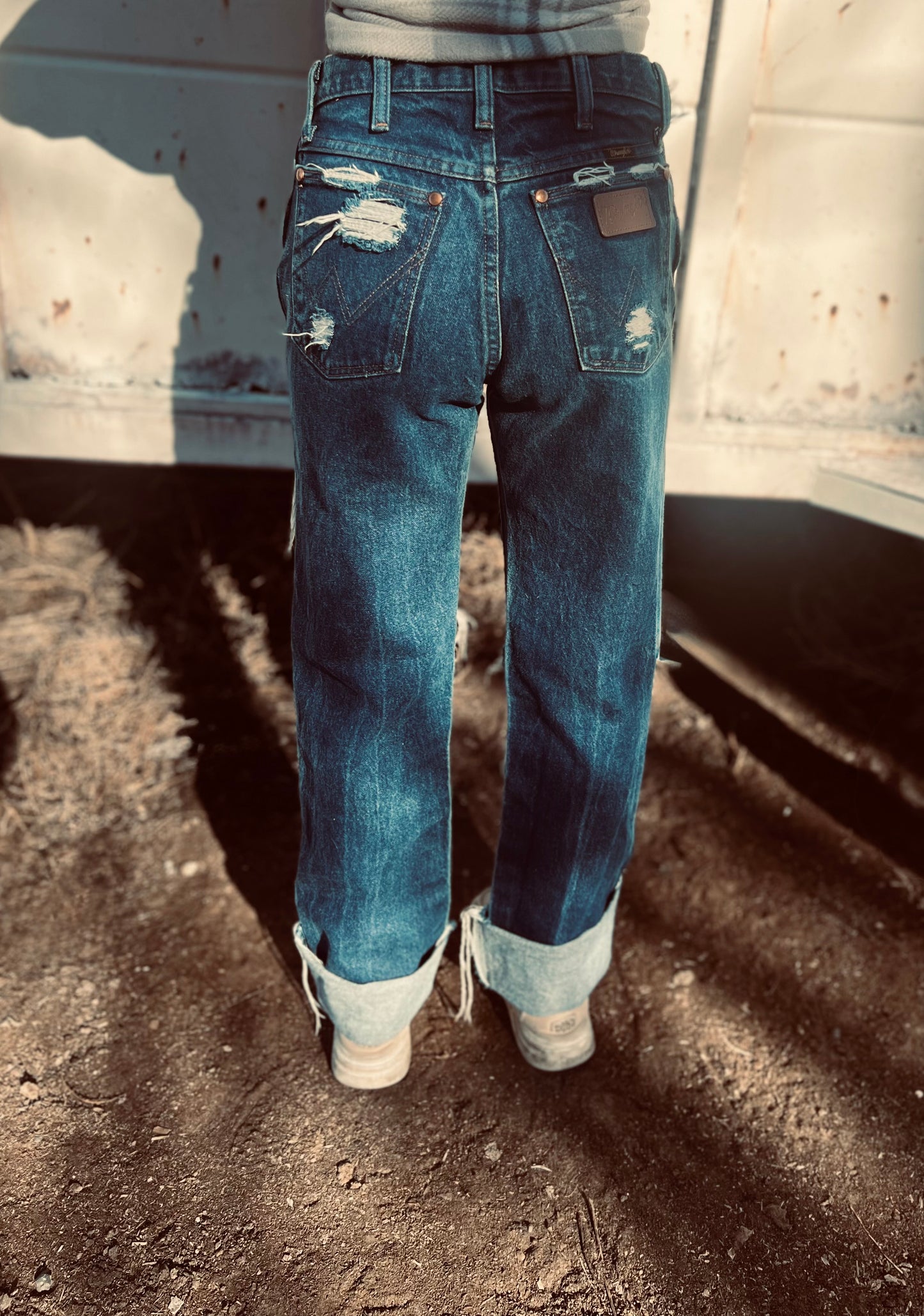 Wranglers, distressed denim