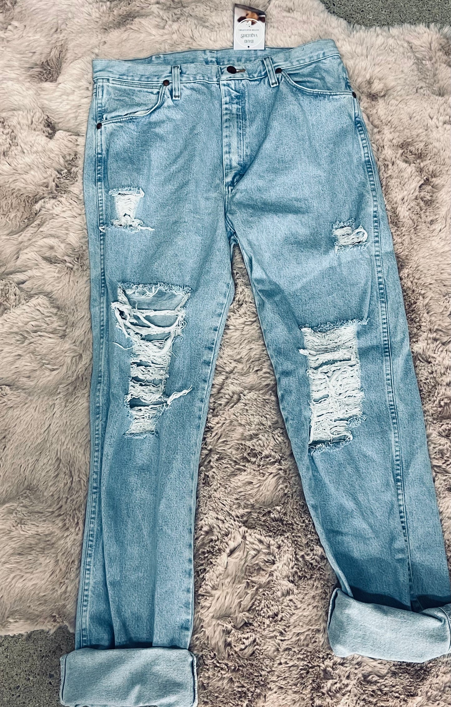 Wrangler light wash, distressed denim