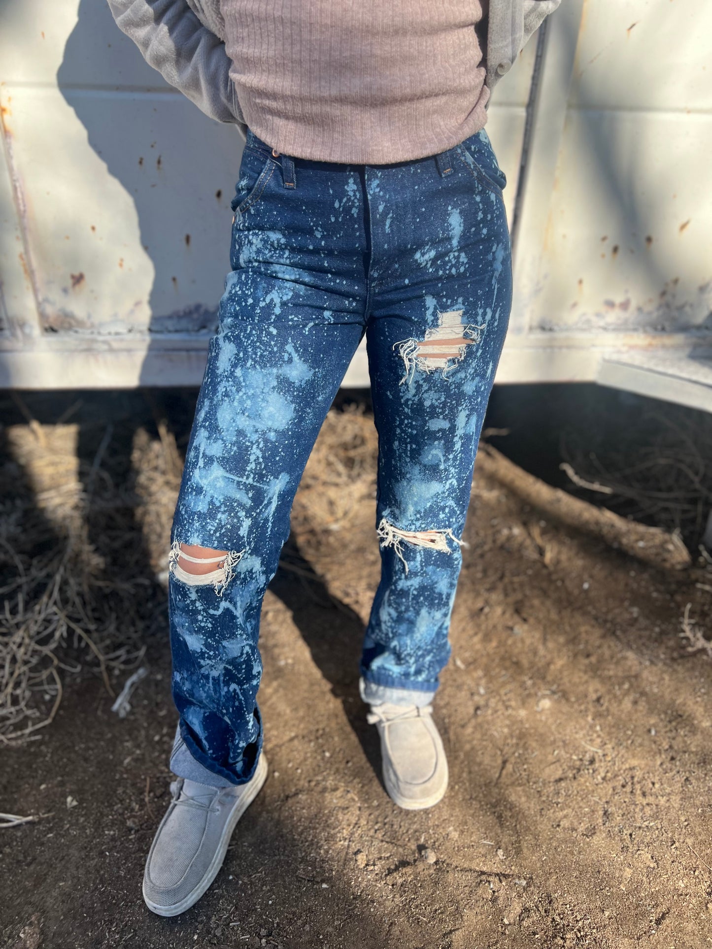 Wranglers, distressed denim Bleached