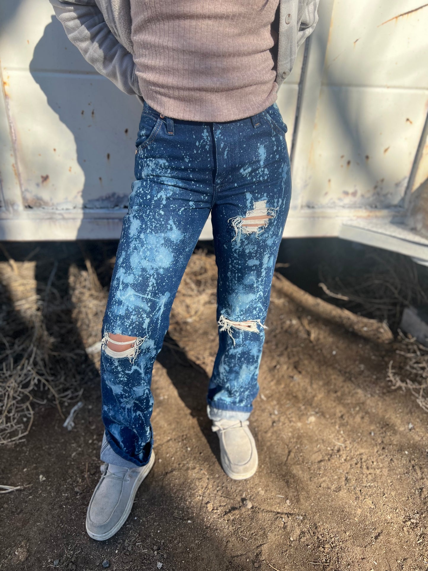 Wranglers, distressed denim Bleached