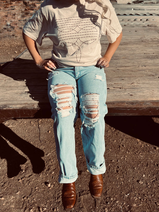 Wrangler light wash, distressed denim