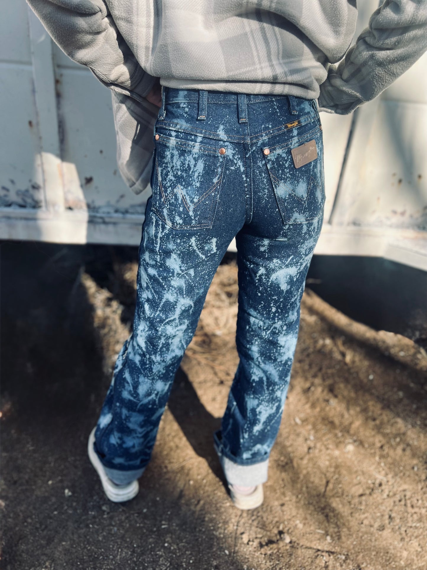 Wranglers, distressed denim Bleached